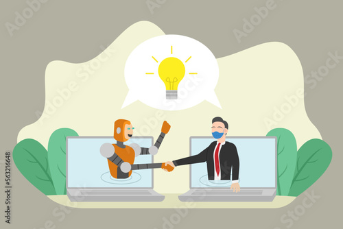 Robot and businessman handshake on laptop computer