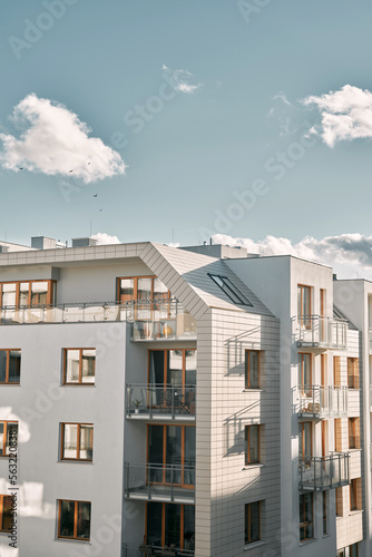 New modern apartment complex. Low-rise European apartment building complex with outdoor facilities.
