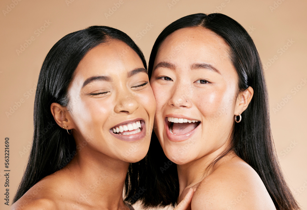 Face, skin and diversity with model woman friends closeup in studio on a beige background. Skincare, facial or cosmetics with an attractive young female and friend posing to promote a beauty product Face, skin and diversity with model woman friends closeup in studio on a beige background. Skincare, facial or cosmetics with an attractive young female and friend posing to promote a beauty product