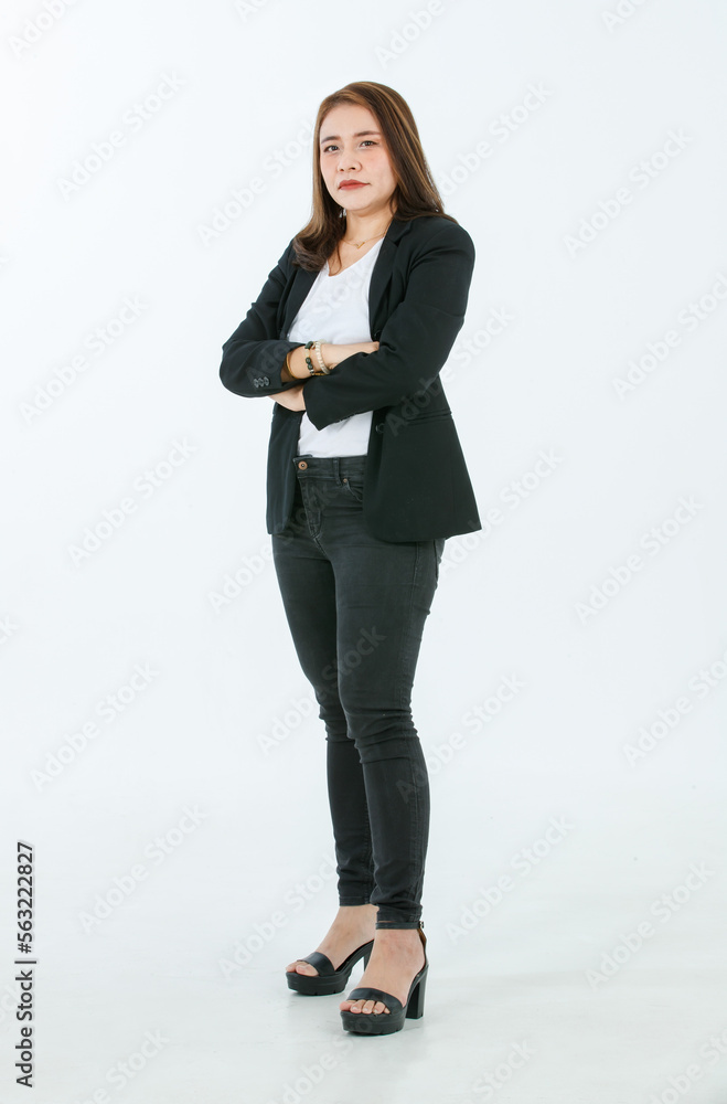 Portrait isolated cutout studio full body shot of Asian confident female professional successful businesswoman in formal black suit high heels standing crossed arms look at camera on white background Portrait isolated cutout studio full body shot of Asian confident female professional successful businesswoman in formal black suit high heels standing crossed arms look at camera on white background