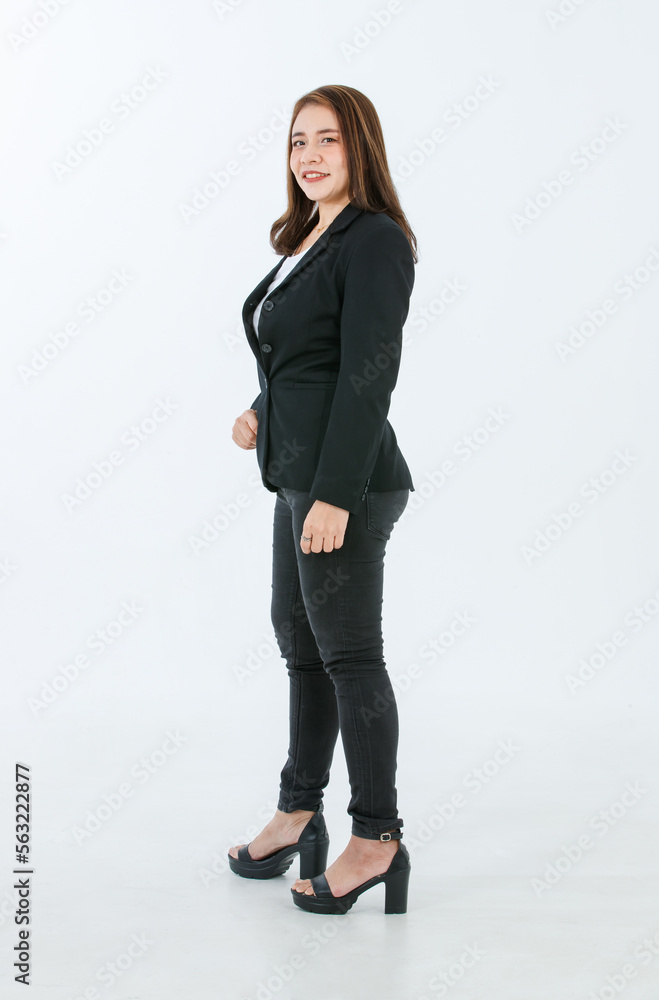 Portrait isolated cutout studio full body shot of Asian confident female professional successful businesswoman in formal black suit high heels standing post look at camera on white background Portrait isolated cutout studio full body shot of Asian confident female professional successful businesswoman in formal black suit high heels standing post look at camera on white background