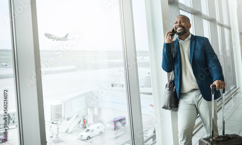 Businessman, phone call and luggage waiting at airport for travel, work trip or plain journey to country. Happy black man, employee or person with smile for communication before flight on smartphone