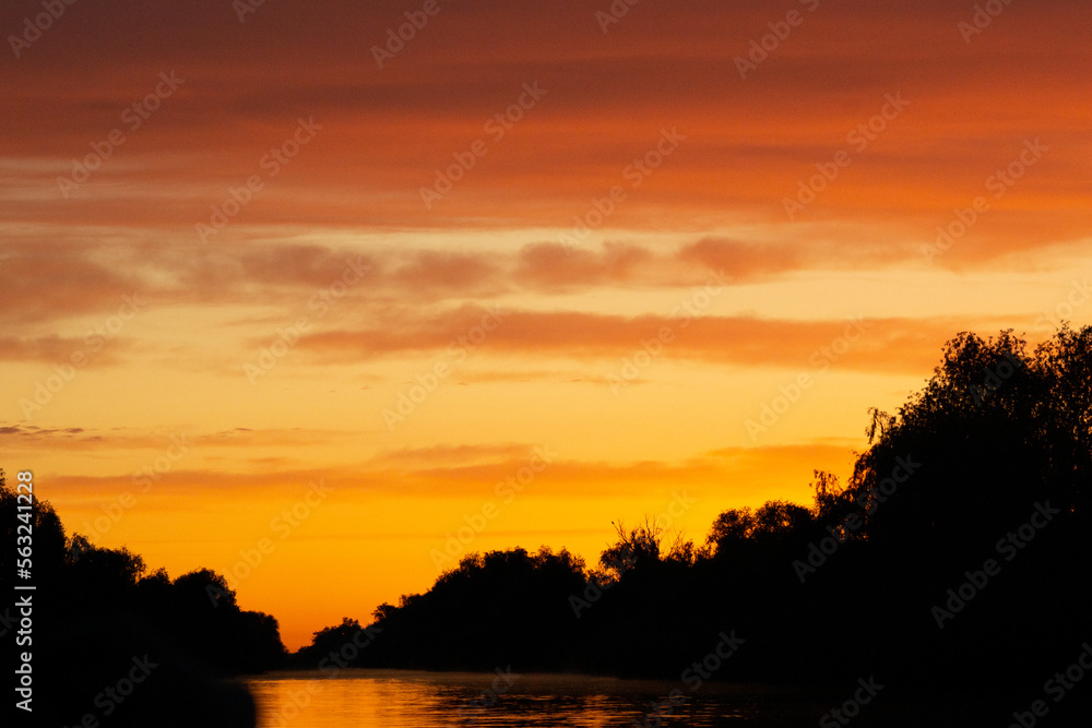 Orange colorful sunset in Danube Delta Romania
