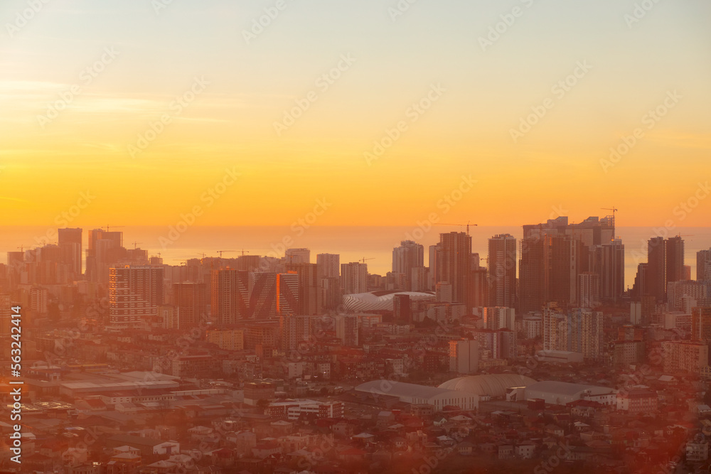 city sunset, sea view, aerial cityscape with modern architecture