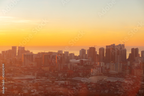 city sunset, sea view, aerial cityscape with modern architecture