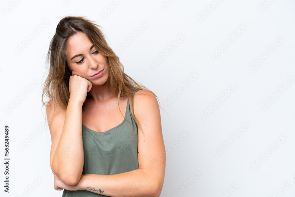 Young caucasian woman isolated on white background with tired and bored expression Young caucasian woman isolated on white background with tired and bored expression