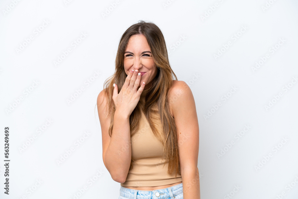 Young caucasian woman isolated on white background happy and smiling covering mouth with hand Young caucasian woman isolated on white background happy and smiling covering mouth with hand