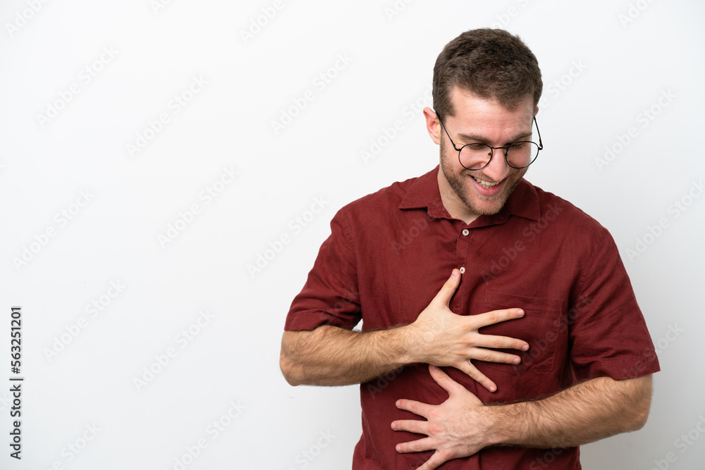 Young caucasian man isolated on white background smiling a lot Young caucasian man isolated on white background smiling a lot
