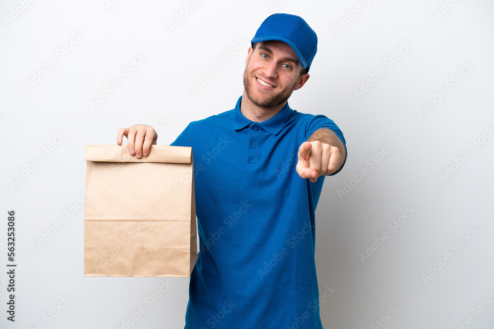 Delivery caucasian man isolated on white background pointing front with happy expression Delivery caucasian man isolated on white background pointing front with happy expression
