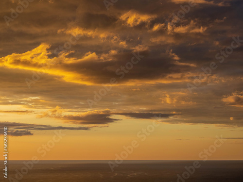 Sunset over Tasman sea at Piha beach, Auckland, New Zealand © Emagnetic