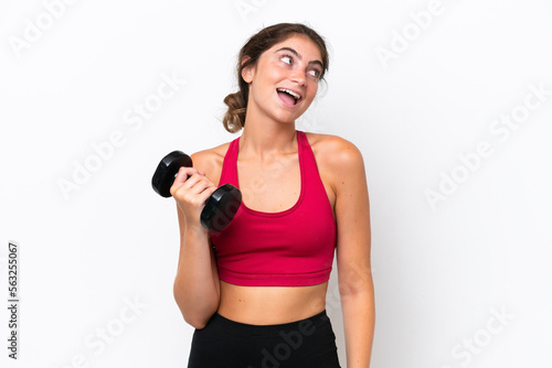 Young sport caucasian woman making weightlifting isolated on white background laughing