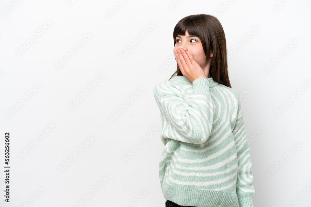 Little caucasian girl isolated on white background doing surprise gesture while looking to the side Little caucasian girl isolated on white background doing surprise gesture while looking to the side