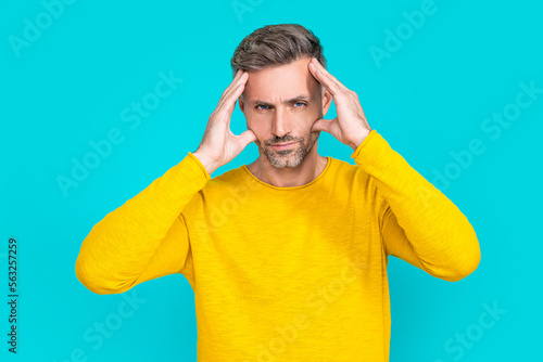 man with headache or migraine on background. photo of man with headache or migraine.