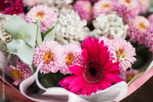 Photos Detail close up of pink gerbera and chrysanthemums bunch