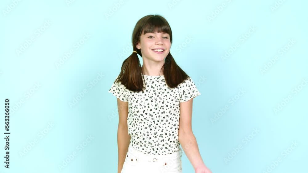 Little girl doing NO gesture over isolated background Little girl doing NO gesture over isolated background