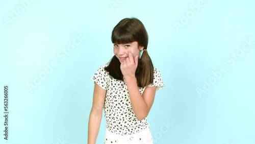 Little girl  looking front over isolated background
