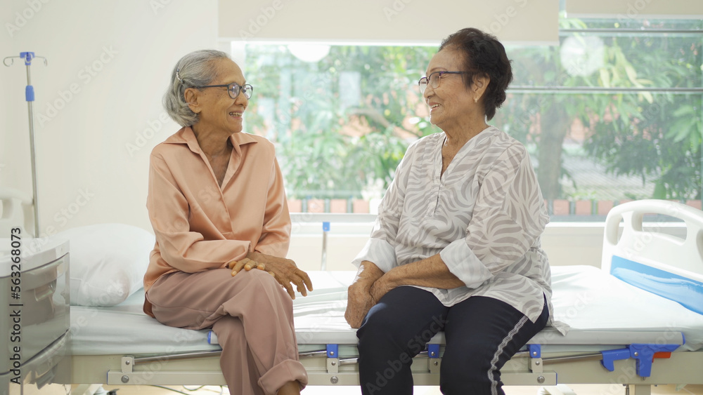 Portrait of happy group of old elderly Asian patient or pensioner people smiling, relaxing, having fun together in nursing home. Senior lifestyle activity recreation. Retirement community. Health care Portrait of happy group of old elderly Asian patient or pensioner people smiling, relaxing, having fun together in nursing home. Senior lifestyle activity recreation. Retirement community. Health care