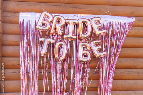 word bride made from balloons at wedding bachelorette party