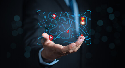 Businessman searching world map with location point, GPS app, Destination travel maps and find places in the online system, searching by satellite system.