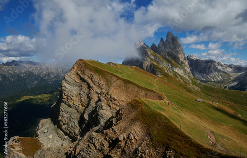Beautiful scenic view,  Seceda peak in Dolomites, Odle mountain range, peak above the clouds Italian Alps, Italy, Europe