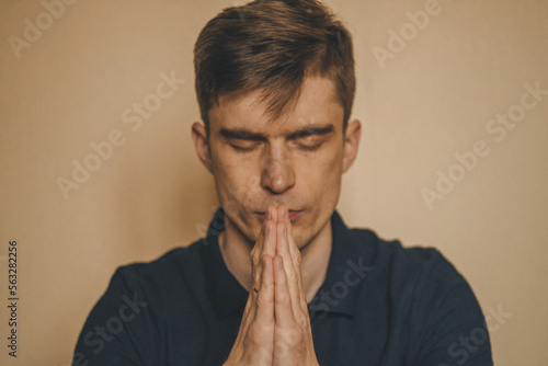 Close-up Of A Praying Man