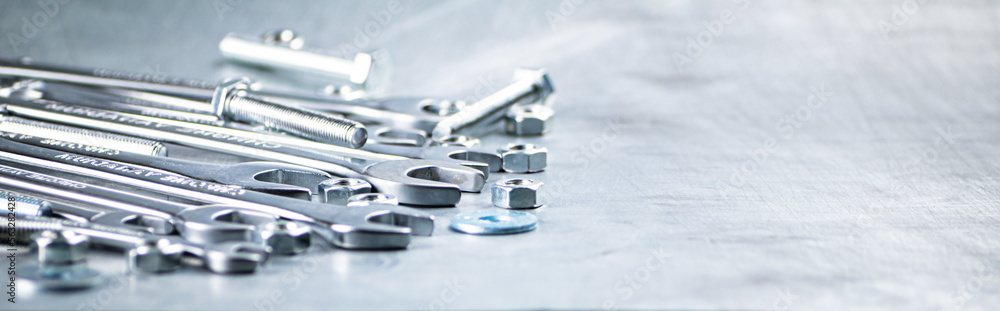 Fototapeta premium Wrench with nuts and bolts.