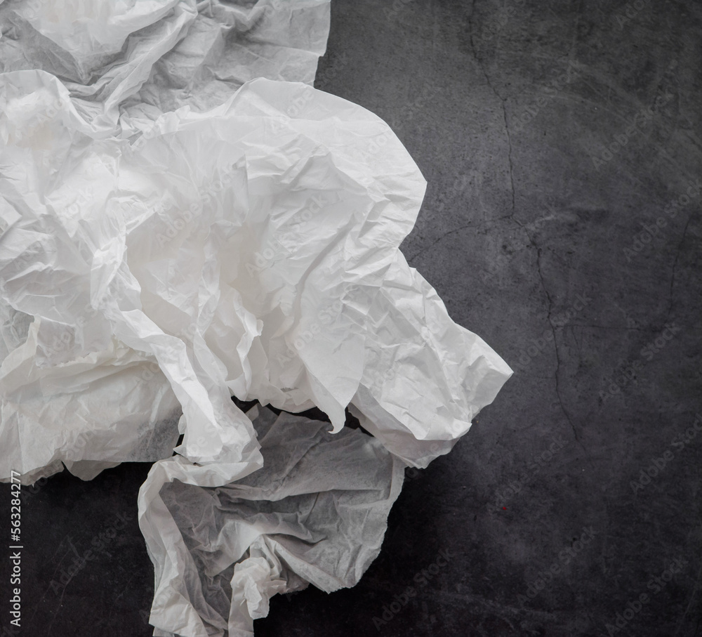 Airy white paper on a black background. Backgrounds and textures Airy white paper on a black background. Backgrounds and textures