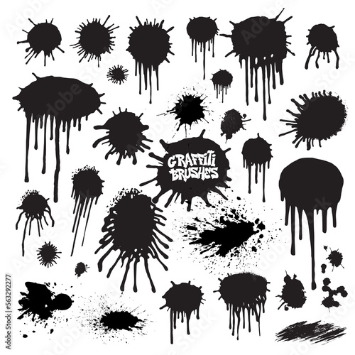 Set of a graffiti brush and drops with spray painted effect on a white background