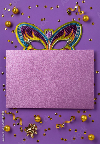 Fototapete Mardi Gras Carnival Masks, Chocolate Candies in Gold foil on Purple Background
