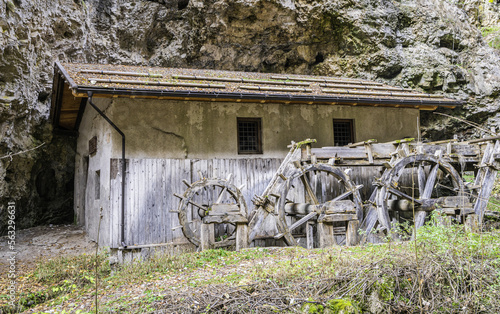 old mill along the Rio Sass di Fondo canyon in Non Valley, Trentino Alto Adige: a scenic excursion among narrow rock walls and fascinating light effects - Fondo, northern Italy . photo