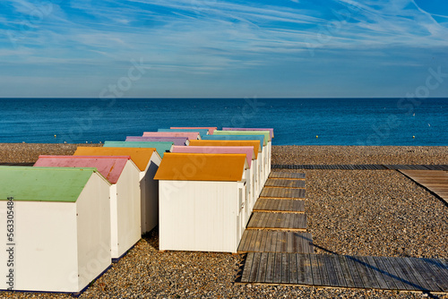 Row of pastel colored bathing huts at Le Treport beach, Normandy, France	
 photo