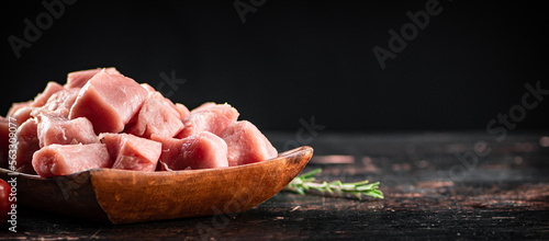 Pieces of fresh raw pork on a plate. 