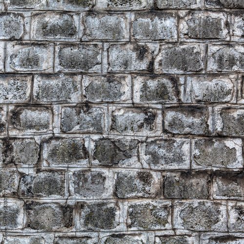 Obraz na płótnie Grunge wall background build from huge gray bricks w salonie
