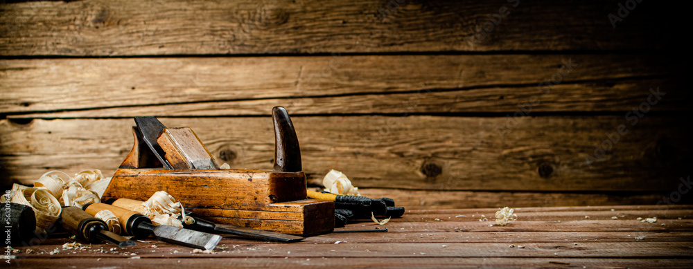 Hand planer with wooden sawdust. Hand planer with wooden sawdust.