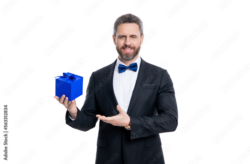 man presenting occasion gift in studio. man hold occasion present box. man holding gift man presenting occasion gift in studio. man hold occasion present box. man holding gift