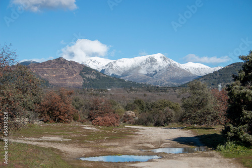 Snow on the peaks of the mountains of La Bola del Mundo and La Maliciosa in the Sierra de Madrid at the beginning of winter photo