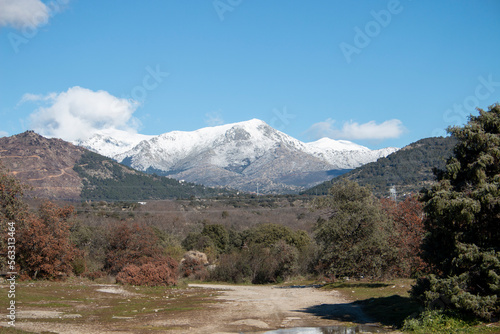 Snow on the peaks of the mountains of La Bola del Mundo and La Maliciosa in the Sierra de Madrid at the beginning of winter photo