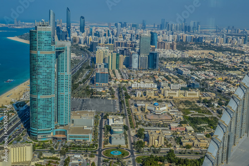 Bird's eye and aerial drone view of Abu Dhabi city from observation deck