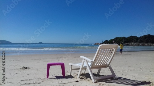 Fototapeta Naklejka Na Ścianę i Meble -  Beach, sea vacation with beautiful sunshine. Coast of southern Brazil.