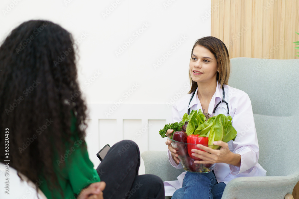 Female woman having a consulting with a professional doctor or nutritionist about eating and nutrition. Female woman having a consulting with a professional doctor or nutritionist about eating and nutrition.
