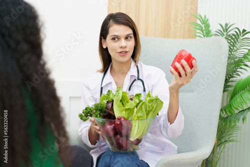 Female woman having a consulting with a professional doctor or nutritionist about eating and nutrition. 