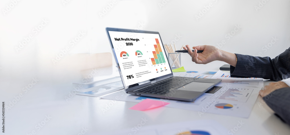 © David - Close up of businesswoman Accounting using calculating income-expenditure and analyzing real estate investment data report Financial and tax systems concept.