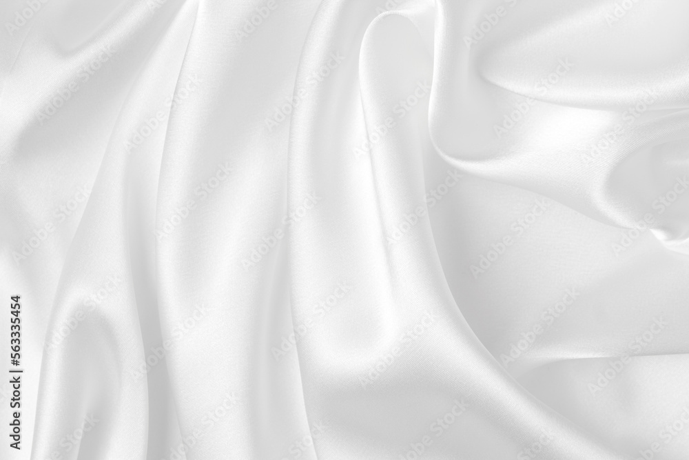 Abstract white fabric texture background. Cloth soft wave. Creases of satin, silk, and cotton. Abstract white fabric texture background. Cloth soft wave. Creases of satin, silk, and cotton.