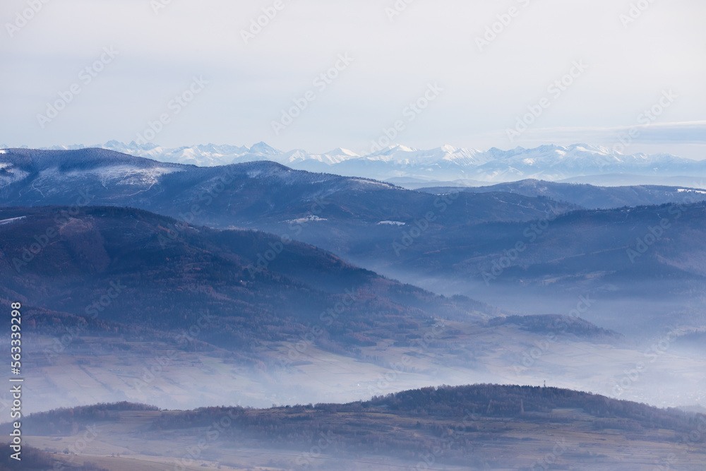 Misty mountains landscape in winter in Poland Misty mountains landscape in winter in Poland