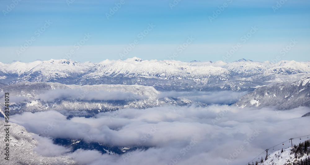 Snow and Cloud covered Canadian Nature Landscape Background. Winter Season in Whistler, British Columbia, Canada. From Blackcomb Mountain