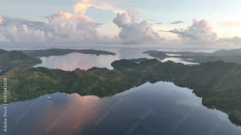 Early morning light illuminates tranquil, tropical scenery in the Solomon Islands. This beautiful Melanesian country is home to extraordinary marine biodiversity and many historic WWII sites. Early morning light illuminates tranquil, tropical scenery in the Solomon Islands. This beautiful Melanesian country is home to extraordinary marine biodiversity and many historic WWII sites.