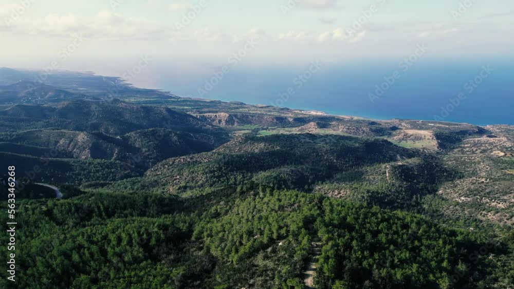 Kantara Kalesi (Cyprus, Kantara Castle). Beautiful video from the drone. Landscape. The high mountains of Cyprus. The sun's rays pass through the clouds. The drone flying through the clouds. The blue Kantara Kalesi (Cyprus, Kantara Castle). Beautiful video from the drone. Landscape. The high mountains of Cyprus. The sun's rays pass through the clouds. The drone flying through the clouds. The blue