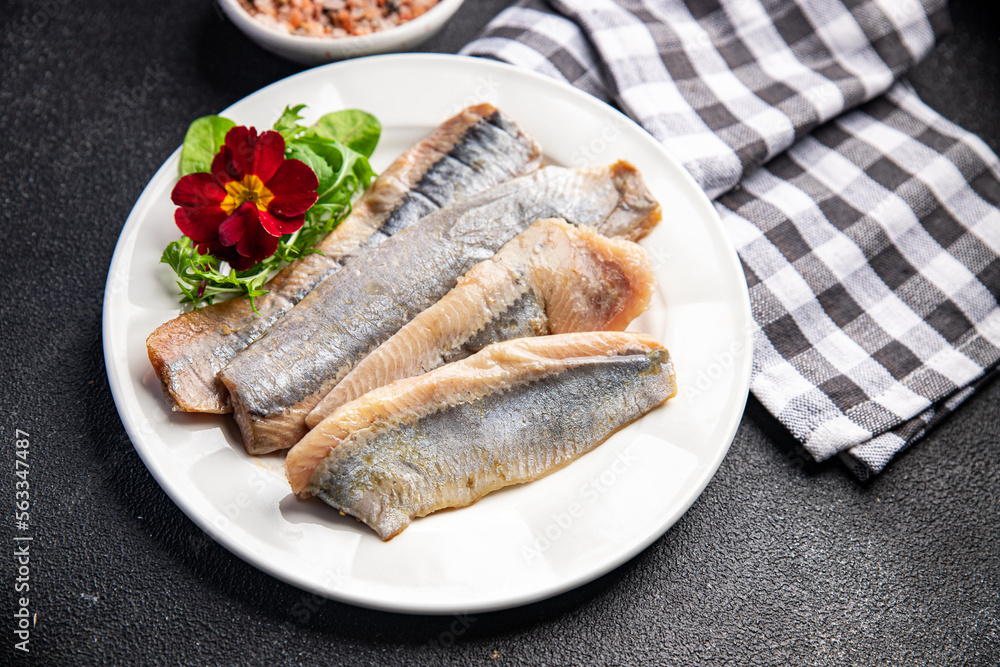 herring salted fish fillet fresh seafood healthy meal food snack on the table copy space food background rustic top view herring salted fish fillet fresh seafood healthy meal food snack on the table copy space food background rustic top view
