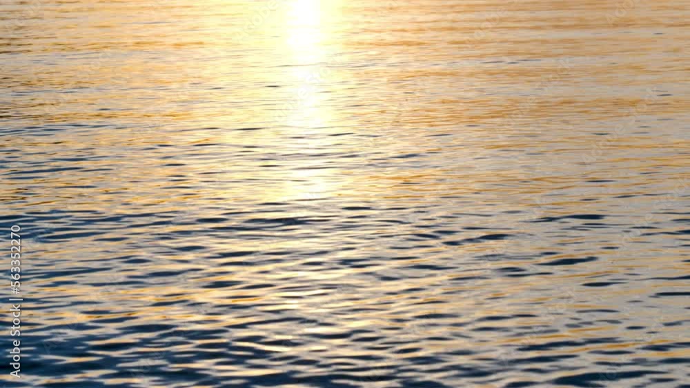 Sunlight sunset sparkles over ocean waves Sunlight sunset sparkles over ocean waves