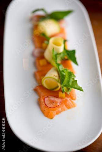 Sashimi sushi. Classic Traditional Japanese cuisine. Raw fish-salmon tuna, mackerel, fluke, bass--sliced very thin and served with a variety of garnishes pickled ginger and wasabi and sauces. 